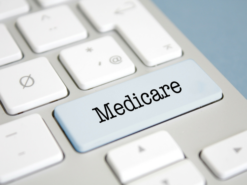 image of computer keyword with medicare as a key